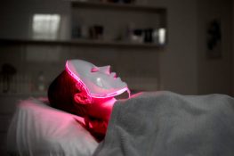 Photodynamic therapy. Cosmetic face mask. the girl is wearing a mask. Health and beauty.